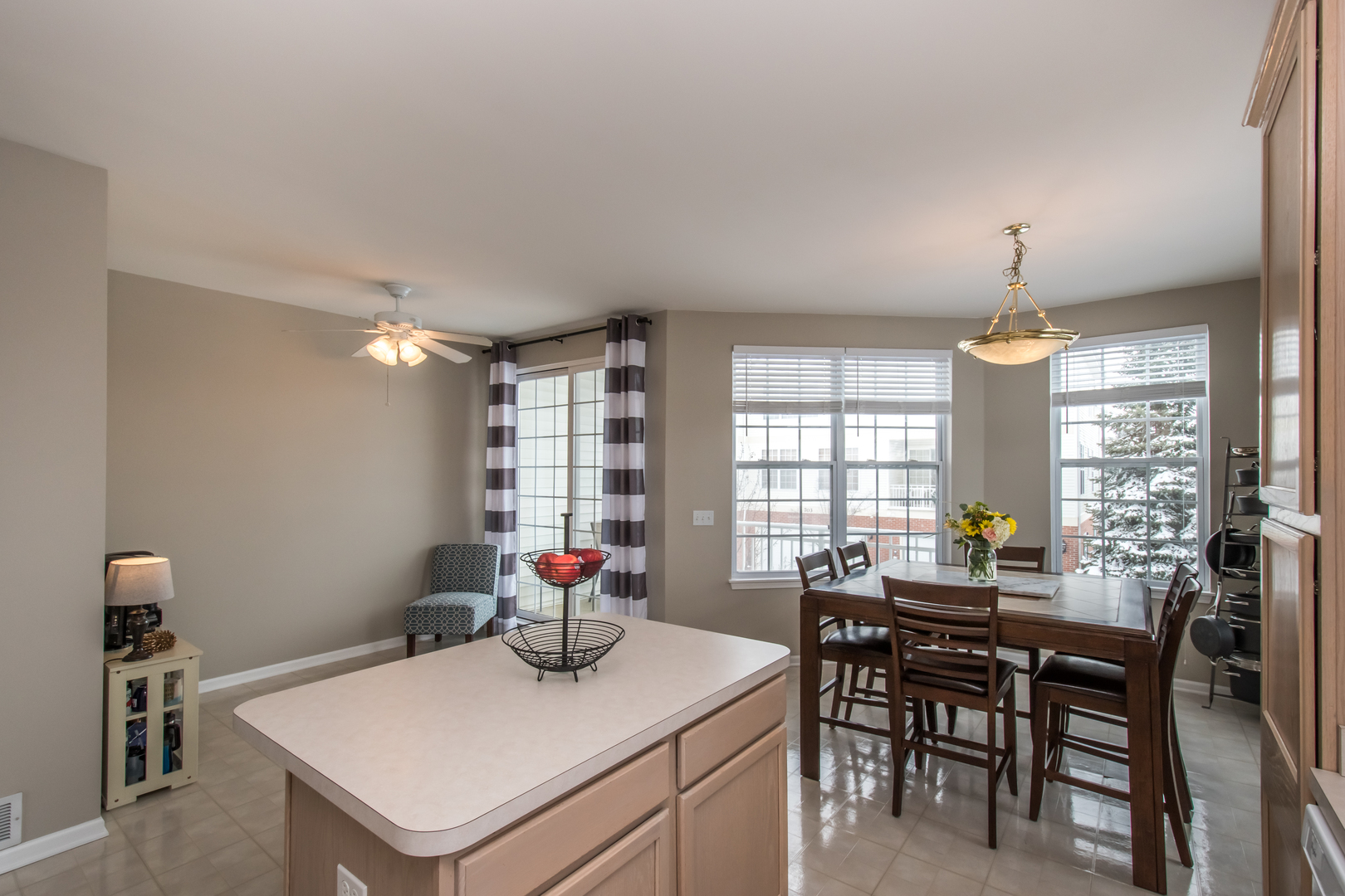 717 Pheasant Trail St. Charles, IL 60174 - Photo 15 of 32 a view of a dining room with furniture and window