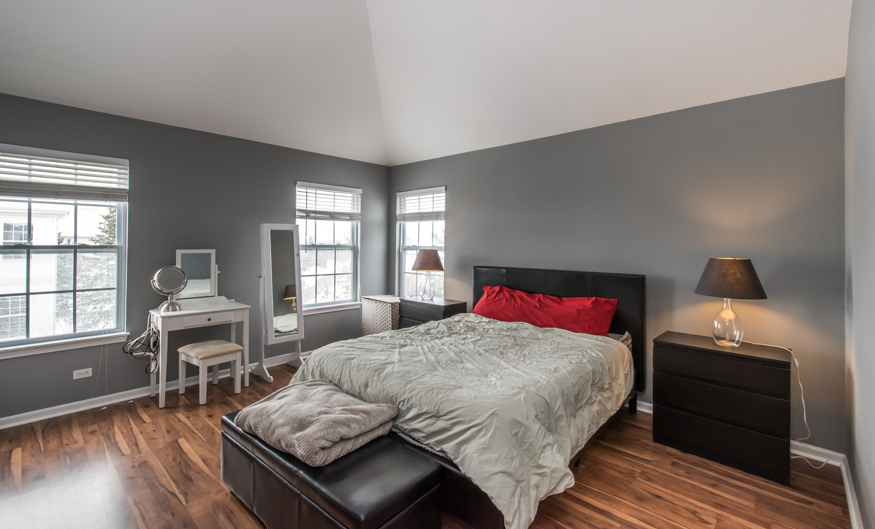 717 Pheasant Trail St. Charles, IL 60174 - Photo 22 of 32 a bedroom with a bed and wooden floor