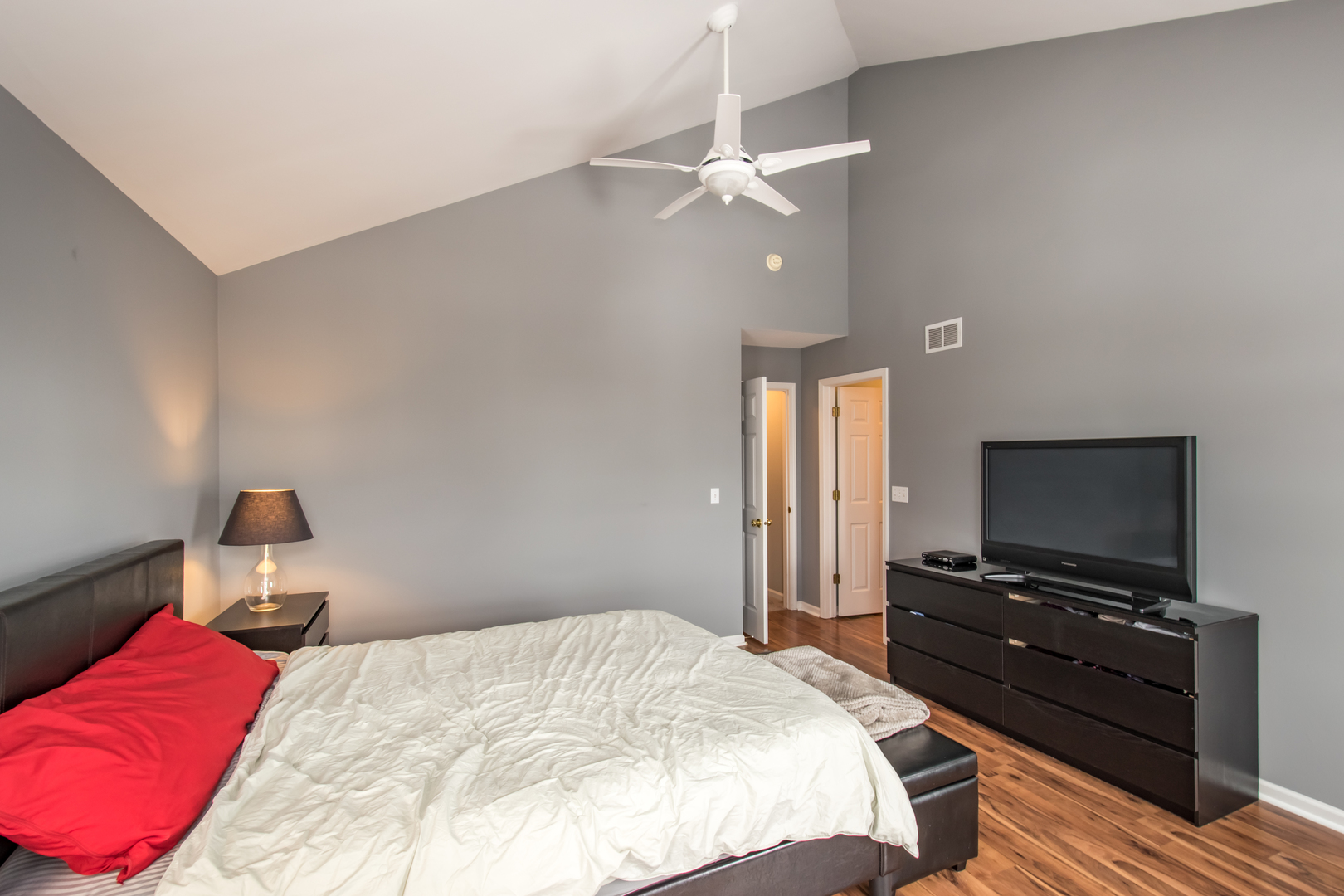 717 Pheasant Trail St. Charles, IL 60174 - Photo 24 of 32 a bedroom with a bed and a flat screen tv