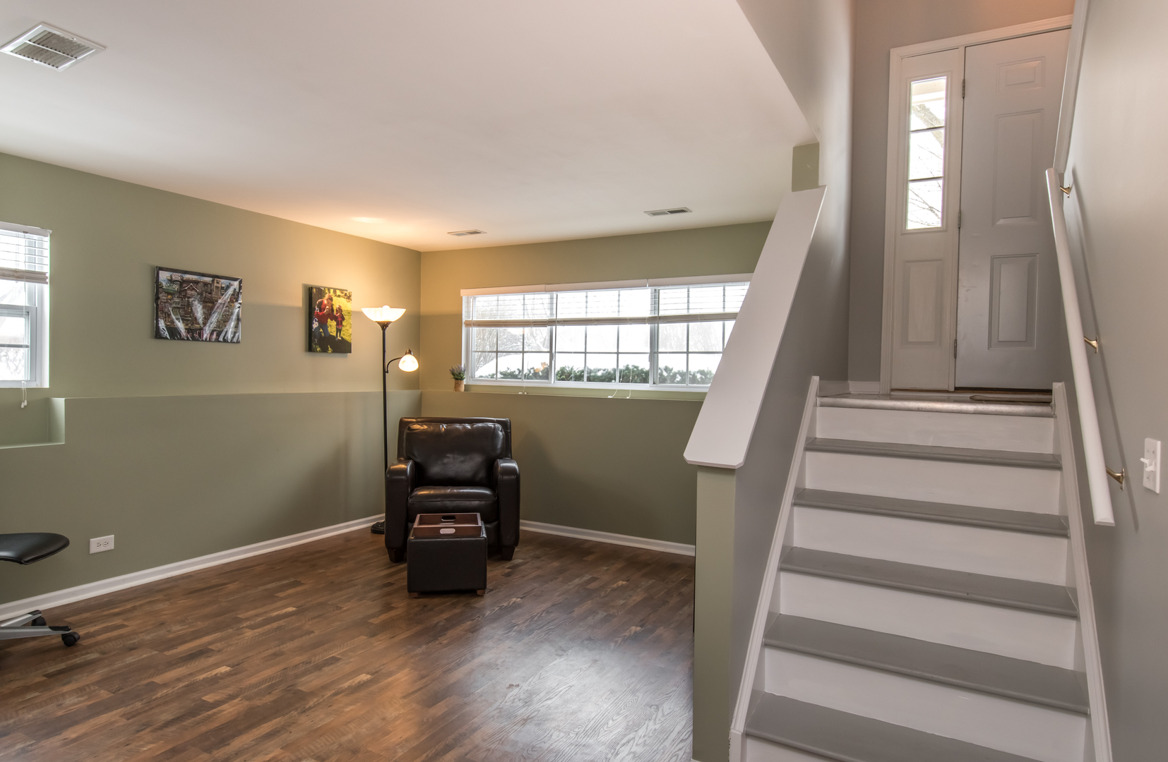 717 Pheasant Trail St. Charles, IL 60174 - Photo 29 of 32 a room with stairs and wooden floor