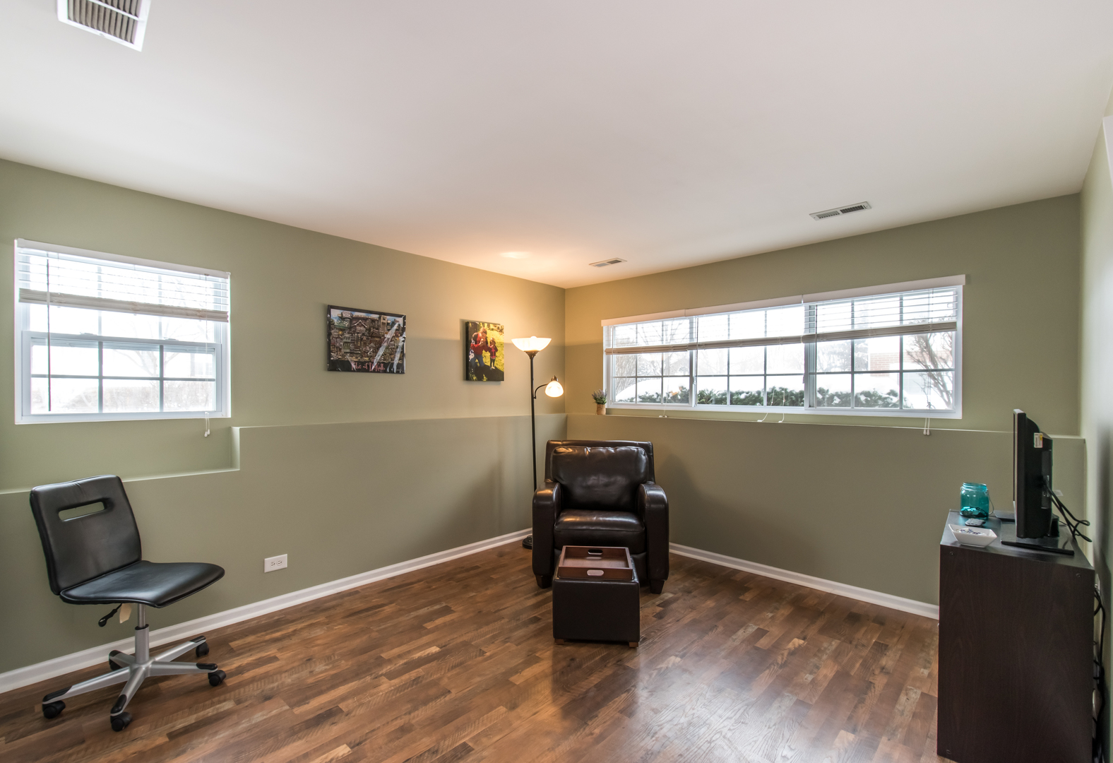 717 Pheasant Trail St. Charles, IL 60174 - Photo 30 of 32 a view of workspace with wooden floor and windows
