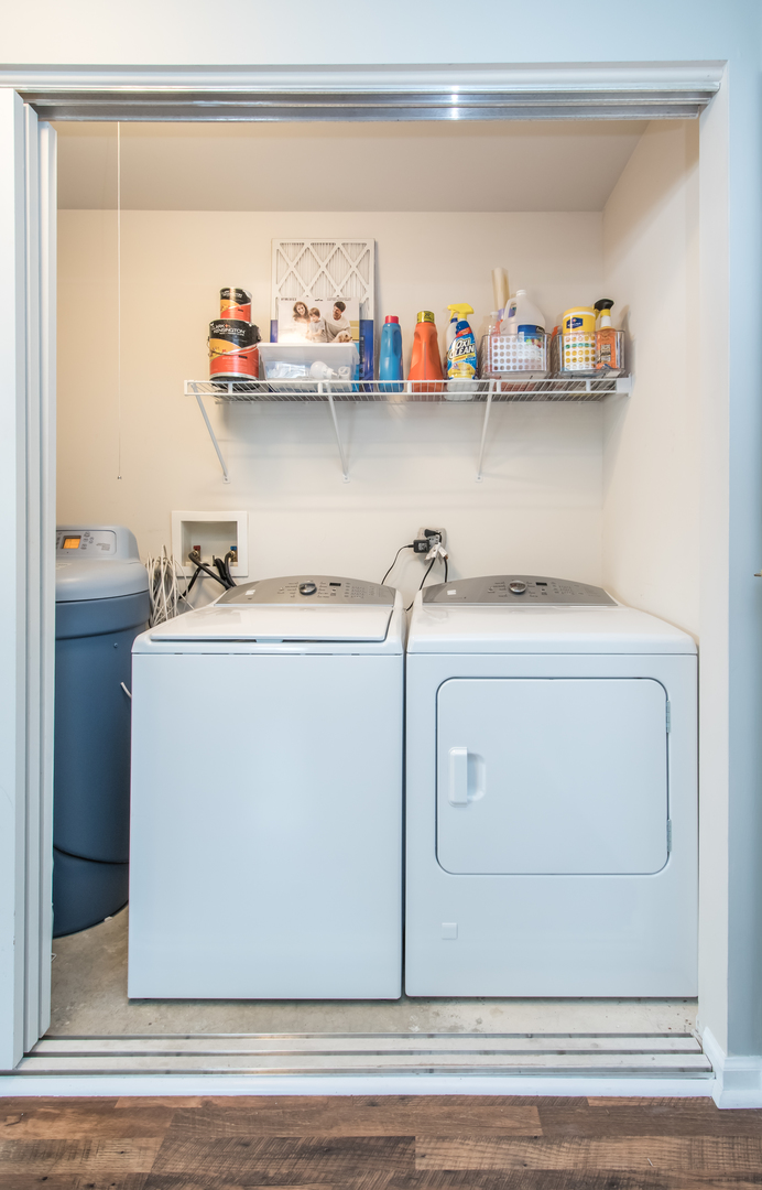 717 Pheasant Trail St. Charles, IL 60174 - Photo 32 of 32 a utility room with washer and dryer