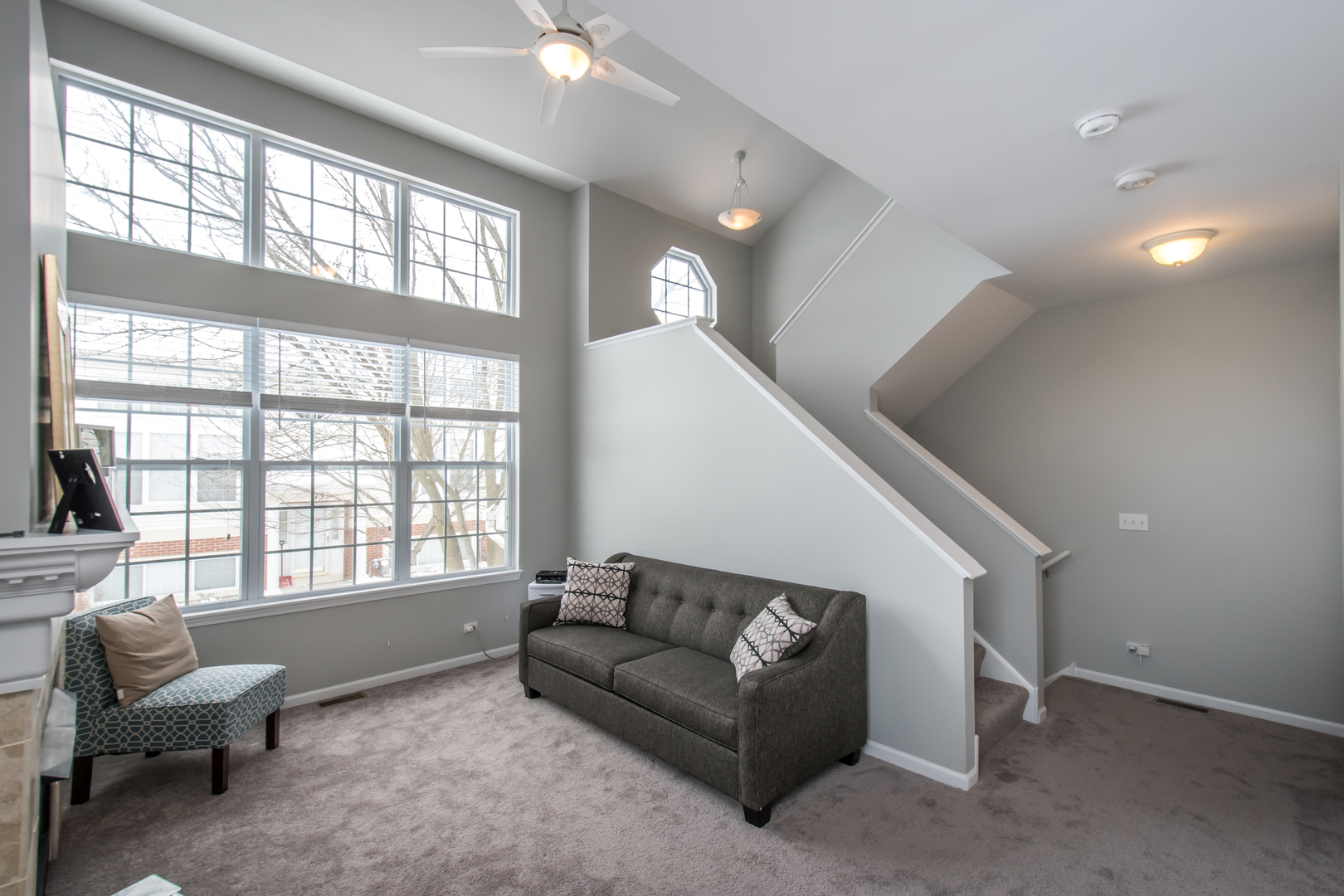 717 Pheasant Trail St. Charles, IL 60174 - Photo 5 of 32 a living room with furniture and a large window