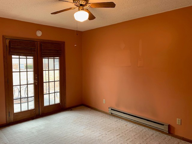 507 Jenkran Street, Unit 4 Morrison, IL 61270 - Photo 8 of 11 a view of an empty room with a window