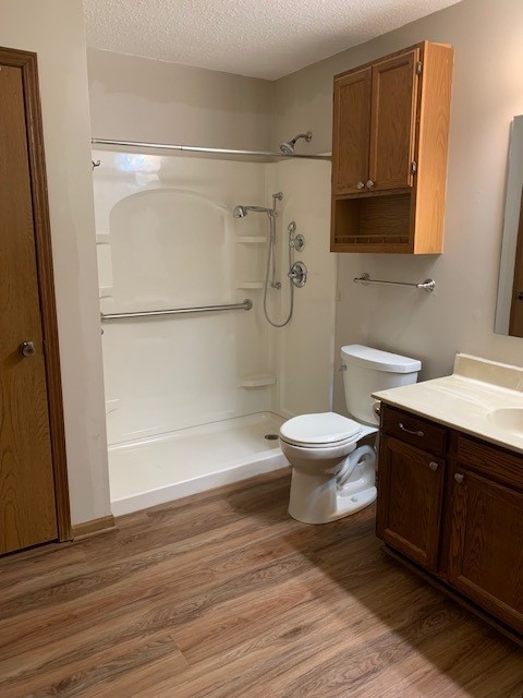 507 Jenkran Street, Unit 4 Morrison, IL 61270 - Photo 10 of 11 a bathroom with a toilet and a shower
