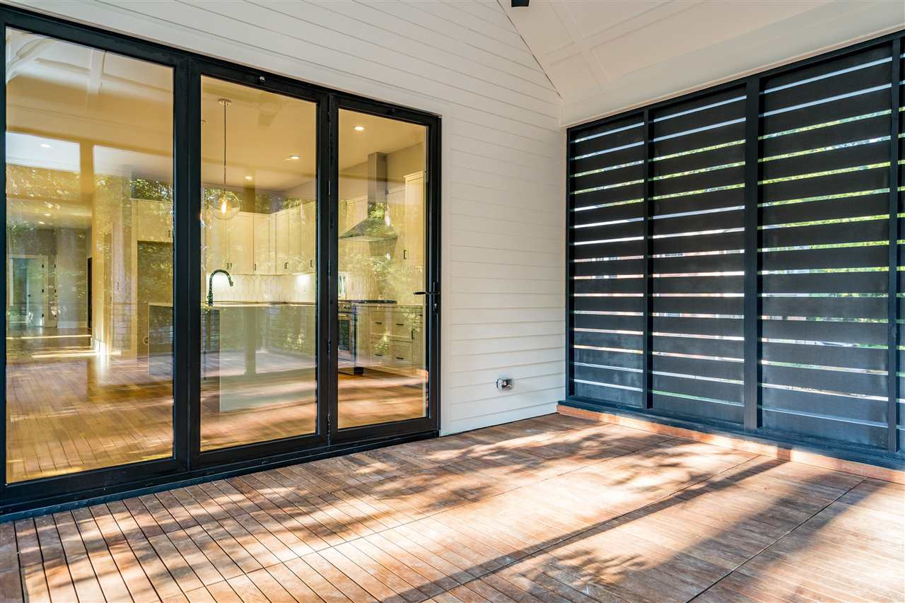 3318 Ruffin Street Raleigh, NC 27607 - Photo 27 of 30 Accordion doors to the interior of the home Screened Porch