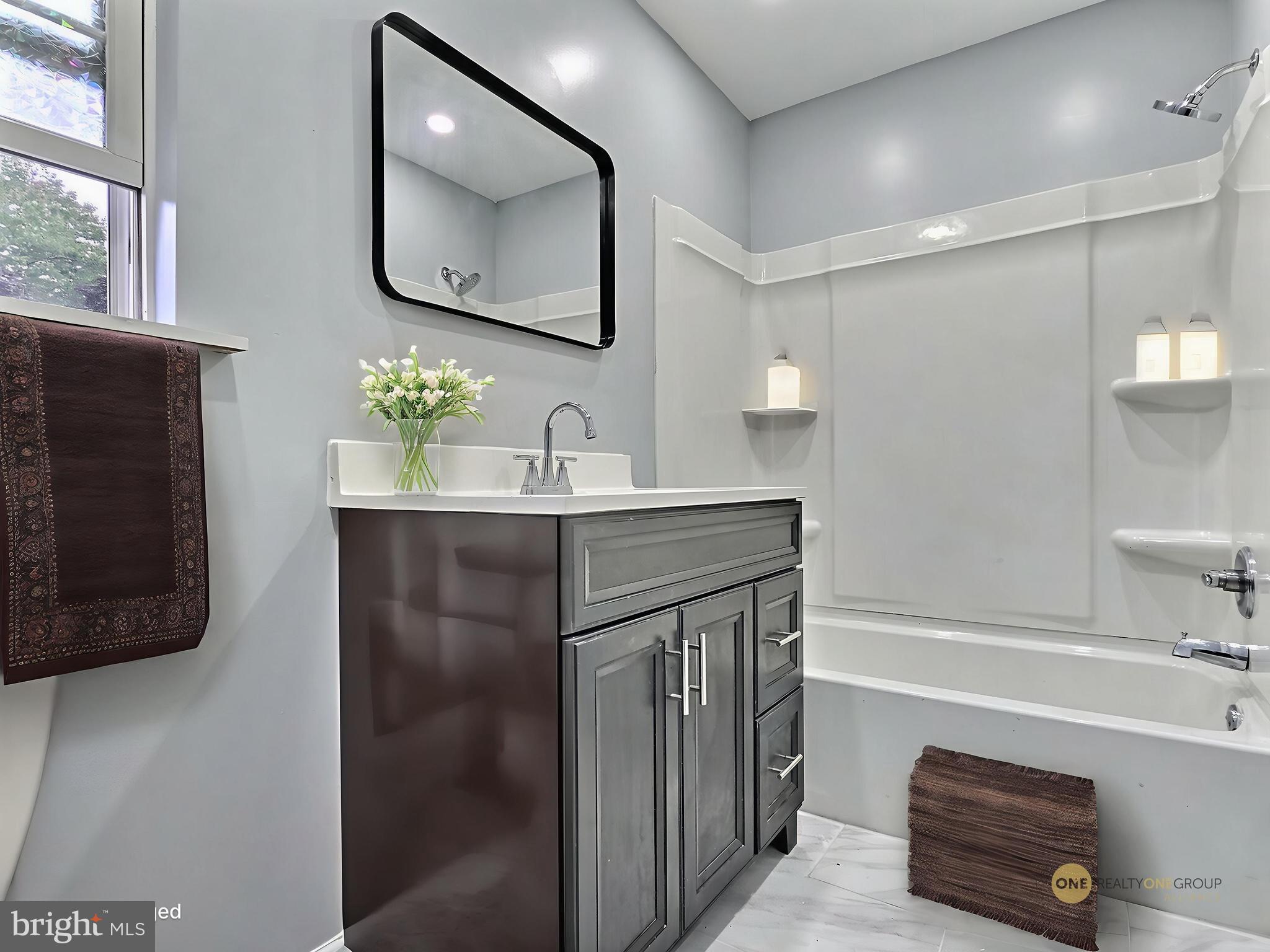 1213 Deer Run Reading, PA 19606 - Photo 23 of 42 a bathroom with a sink and a mirror