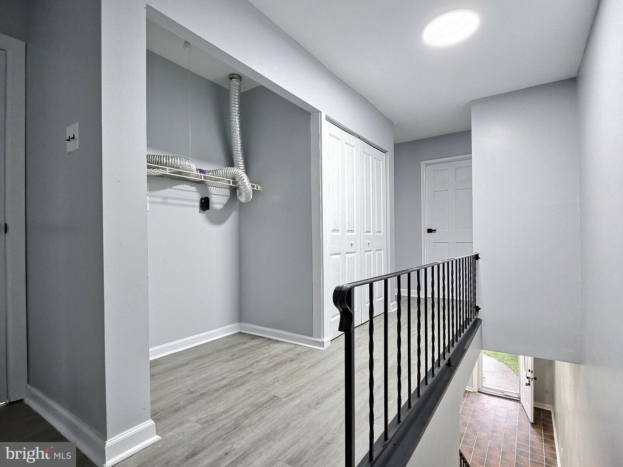 1213 Deer Run Reading, PA 19606 - Photo 24 of 42 a view of a hallway with wooden floor