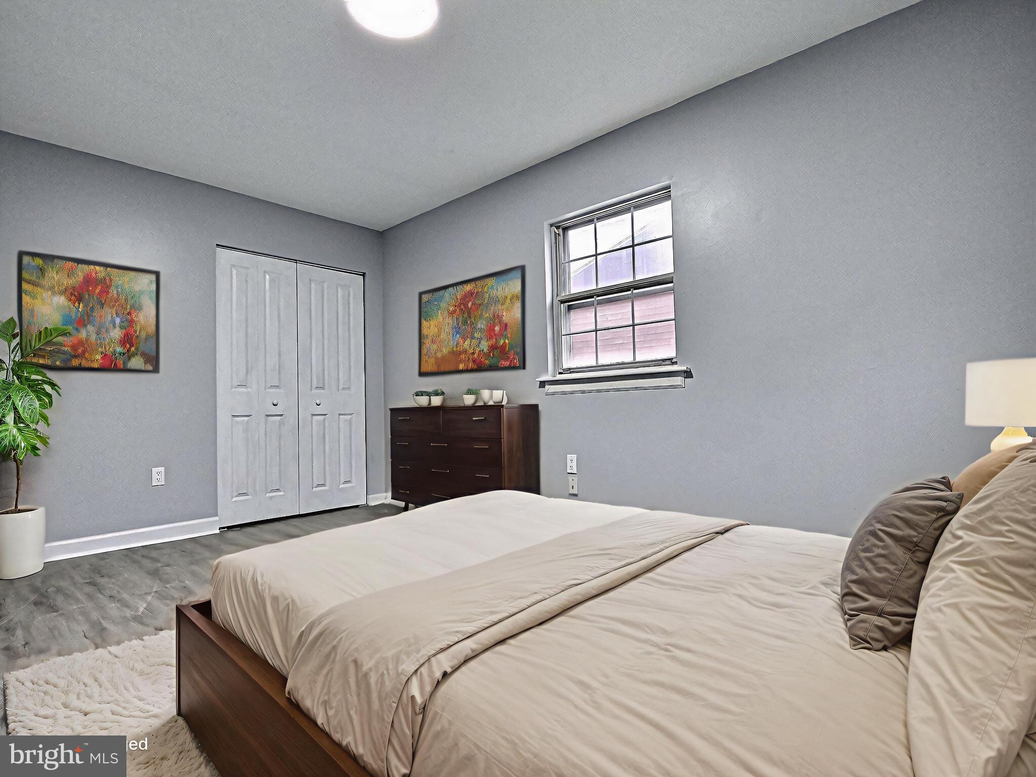 1213 Deer Run Reading, PA 19606 - Photo 32 of 42 a bedroom with a bed and a couch