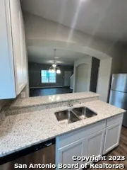 a view of kitchen and sink