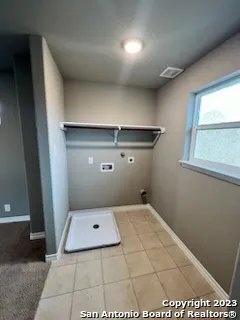 a bathroom with a sink a toilet and a shower