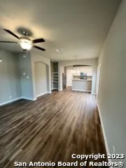 a view of livingroom and hardwood floor