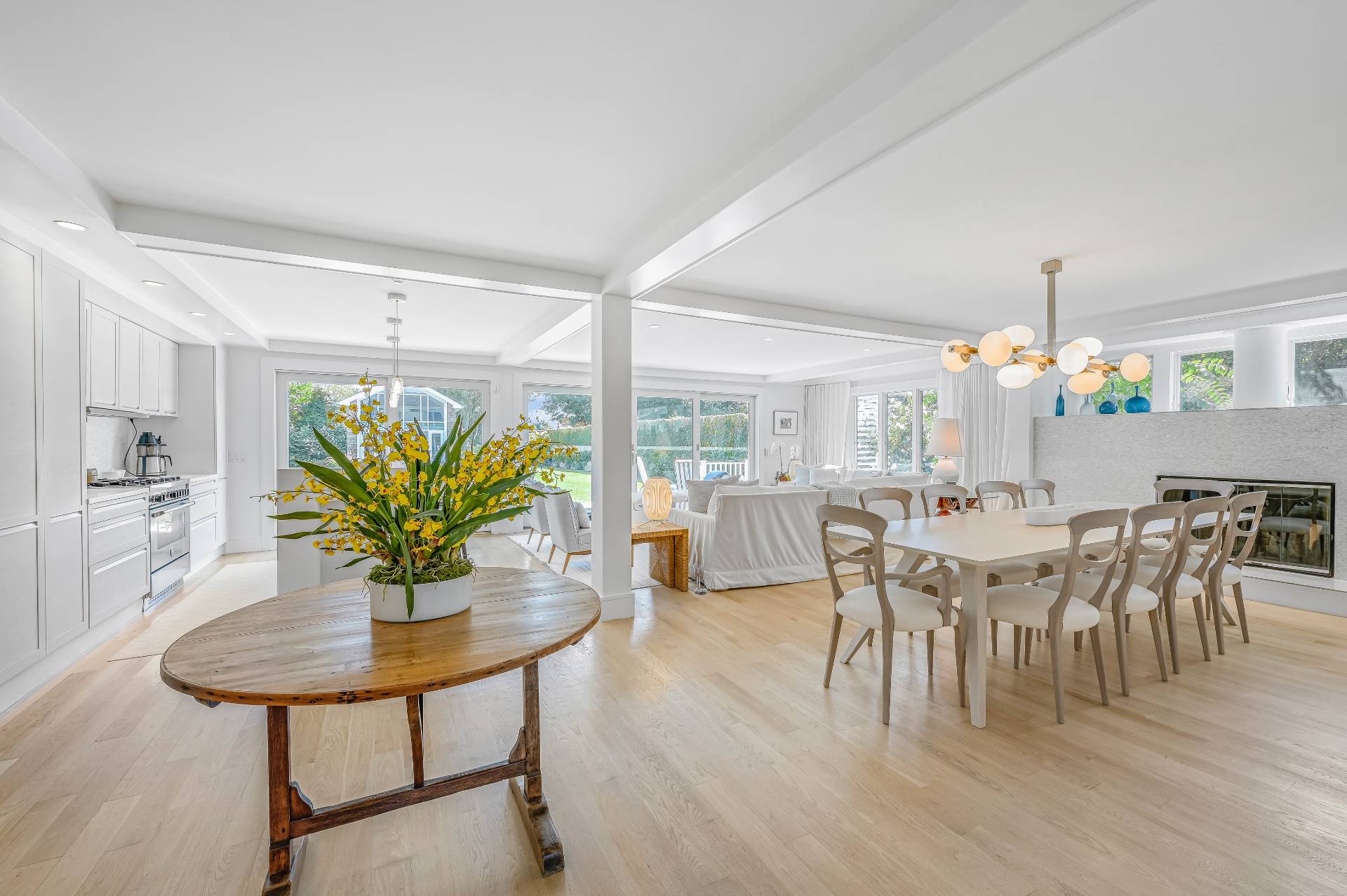 Undisclosed Address Bridgehampton, NY 11932 - Photo 13 of 35 a view of a dining room with furniture and chandelier