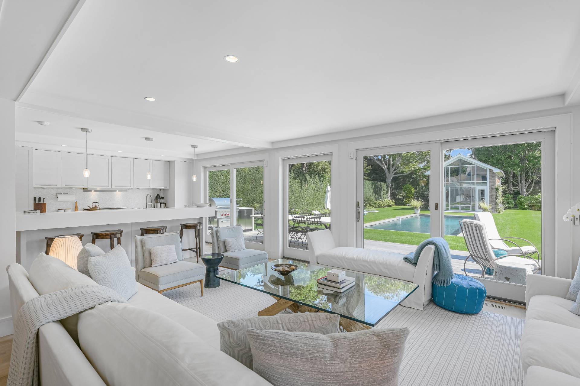 Undisclosed Address Bridgehampton, NY 11932 - Photo 16 of 35 a living room with furniture and a large window