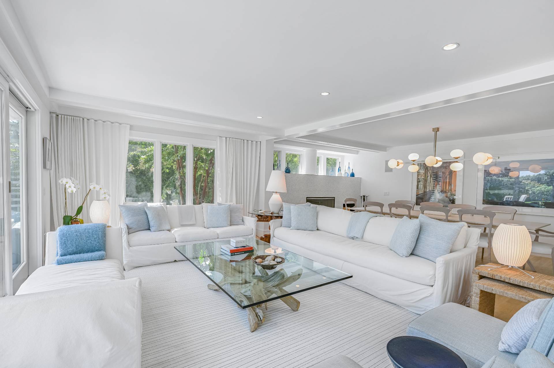 Undisclosed Address Bridgehampton, NY 11932 - Photo 17 of 35 a living room with furniture and a large window
