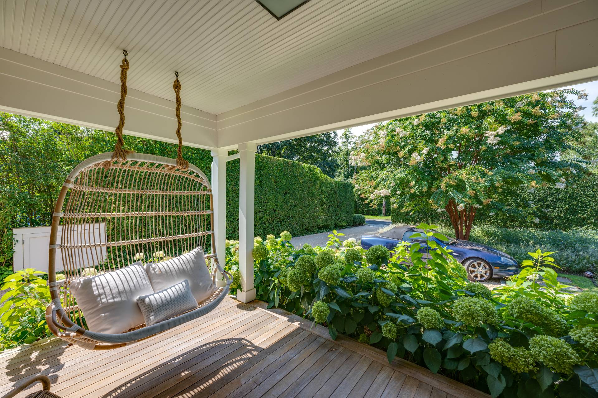 Undisclosed Address Bridgehampton, NY 11932 - Photo 3 of 35 a house view with a garden space