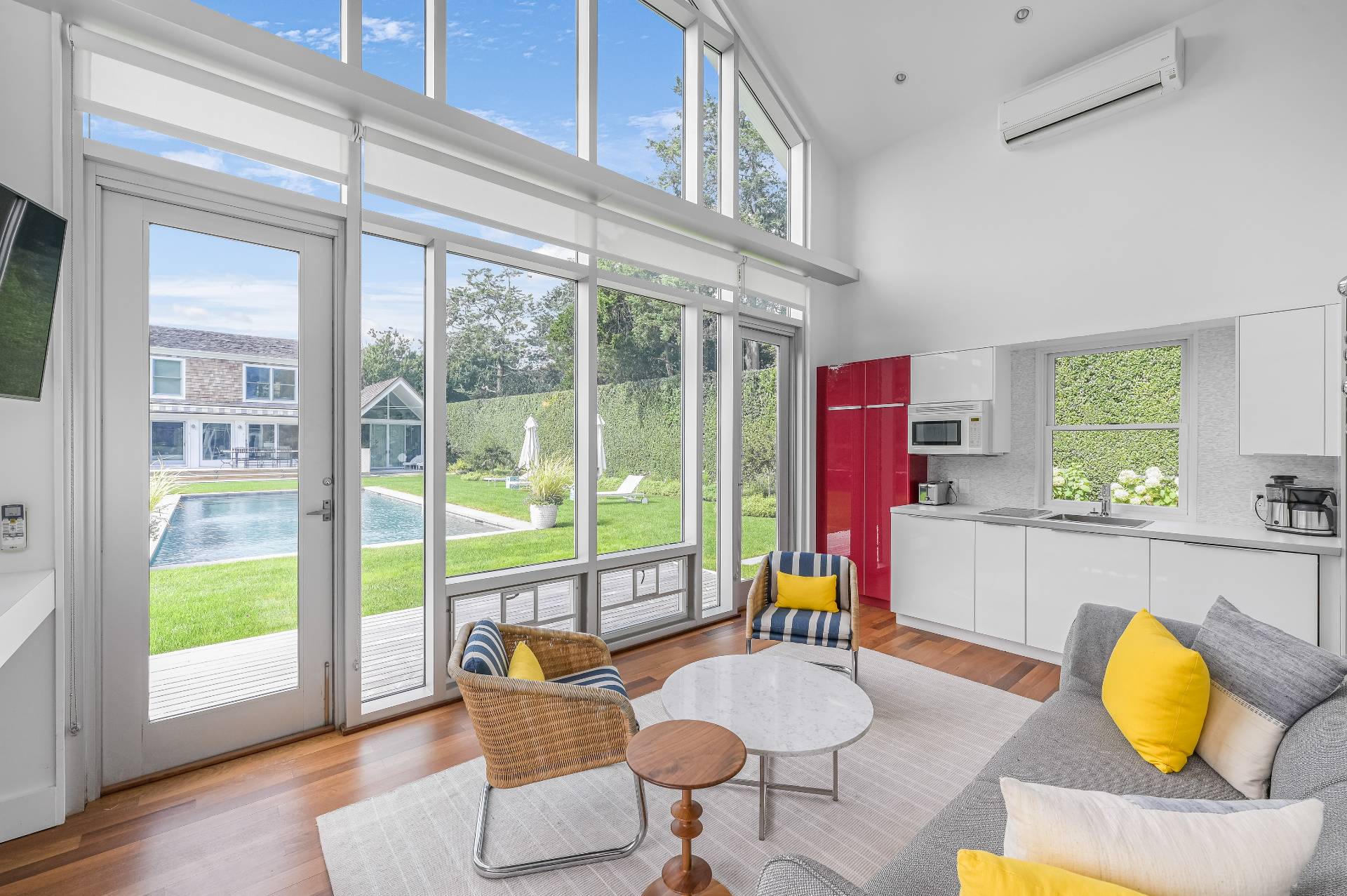 Undisclosed Address Bridgehampton, NY 11932 - Photo 31 of 35 a living room with patio furniture and a large window