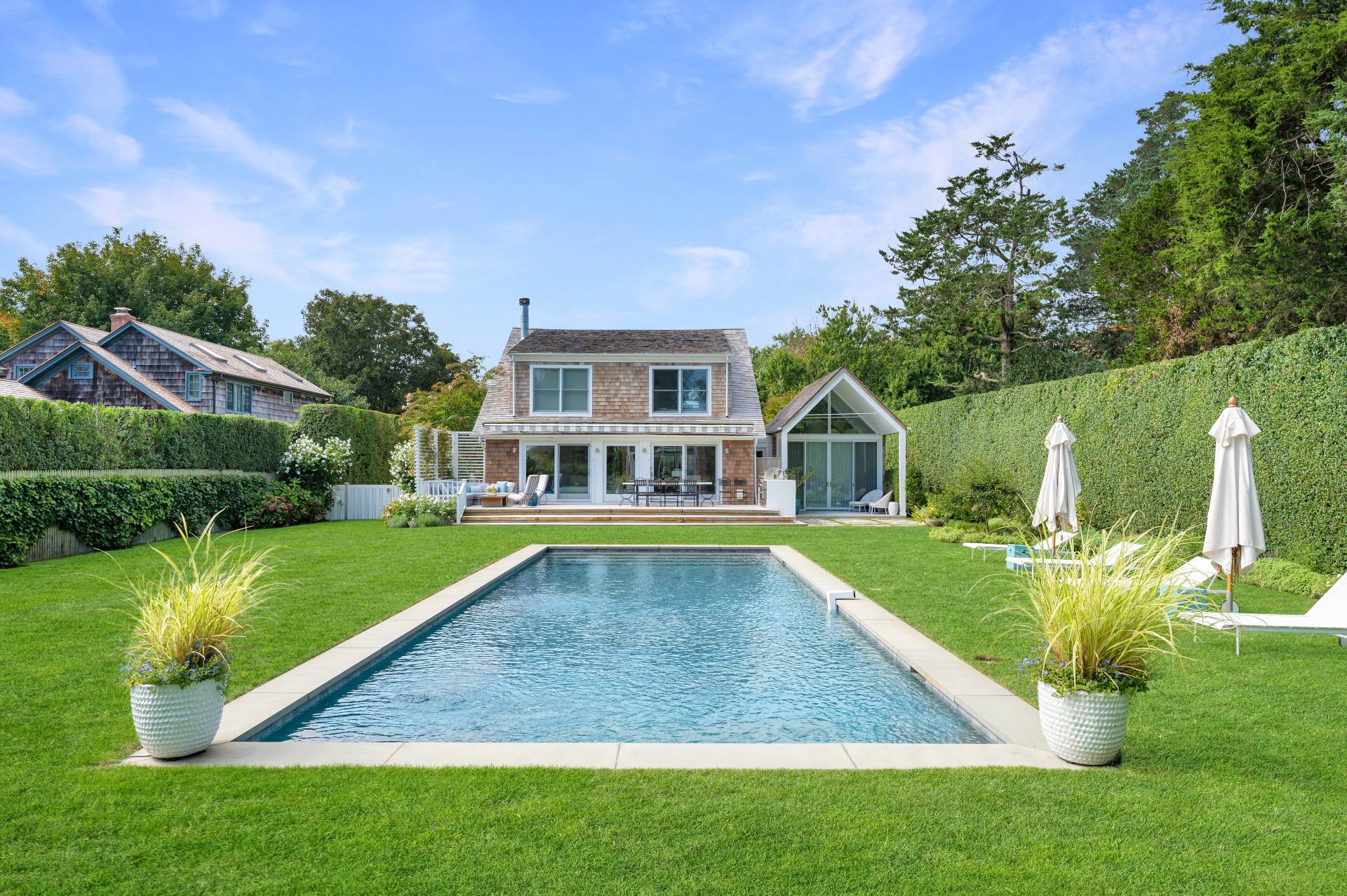 Undisclosed Address Bridgehampton, NY 11932 - Photo 5 of 35 a view of a house with a yard