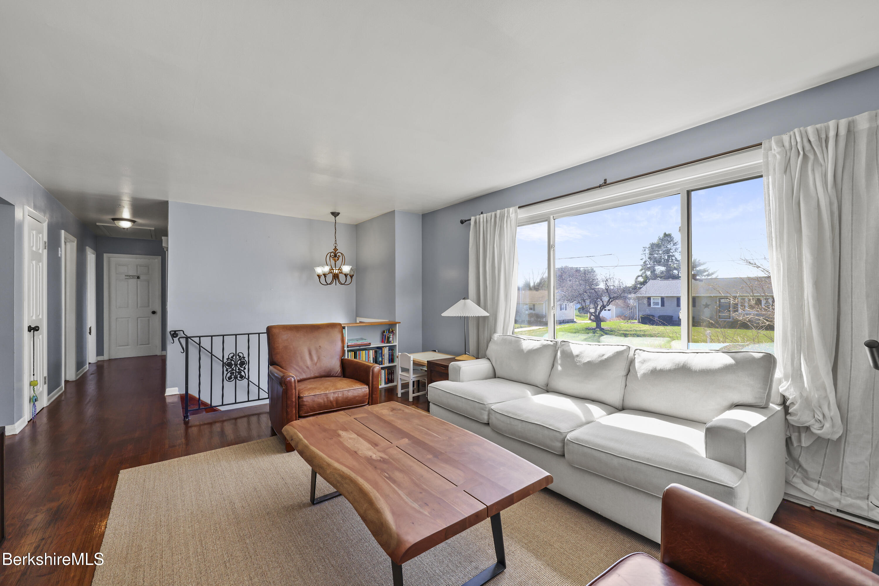 43 Baldwin Avenue Pittsfield, MA 01201 - Photo 11 of 31 a living room with furniture and a large window