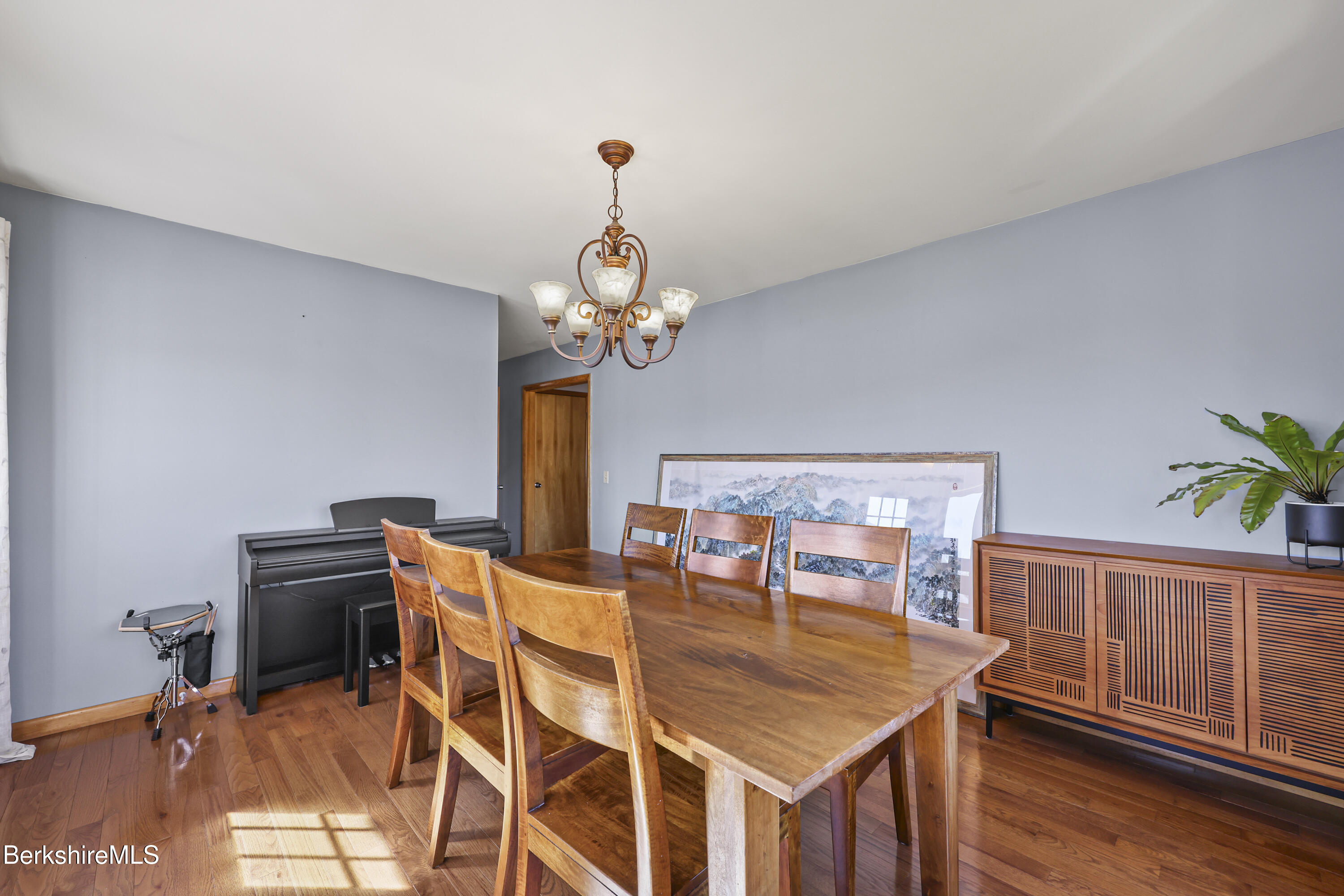 43 Baldwin Avenue Pittsfield, MA 01201 - Photo 17 of 31 a view of a dining room with furniture wooden floor and chandelier
