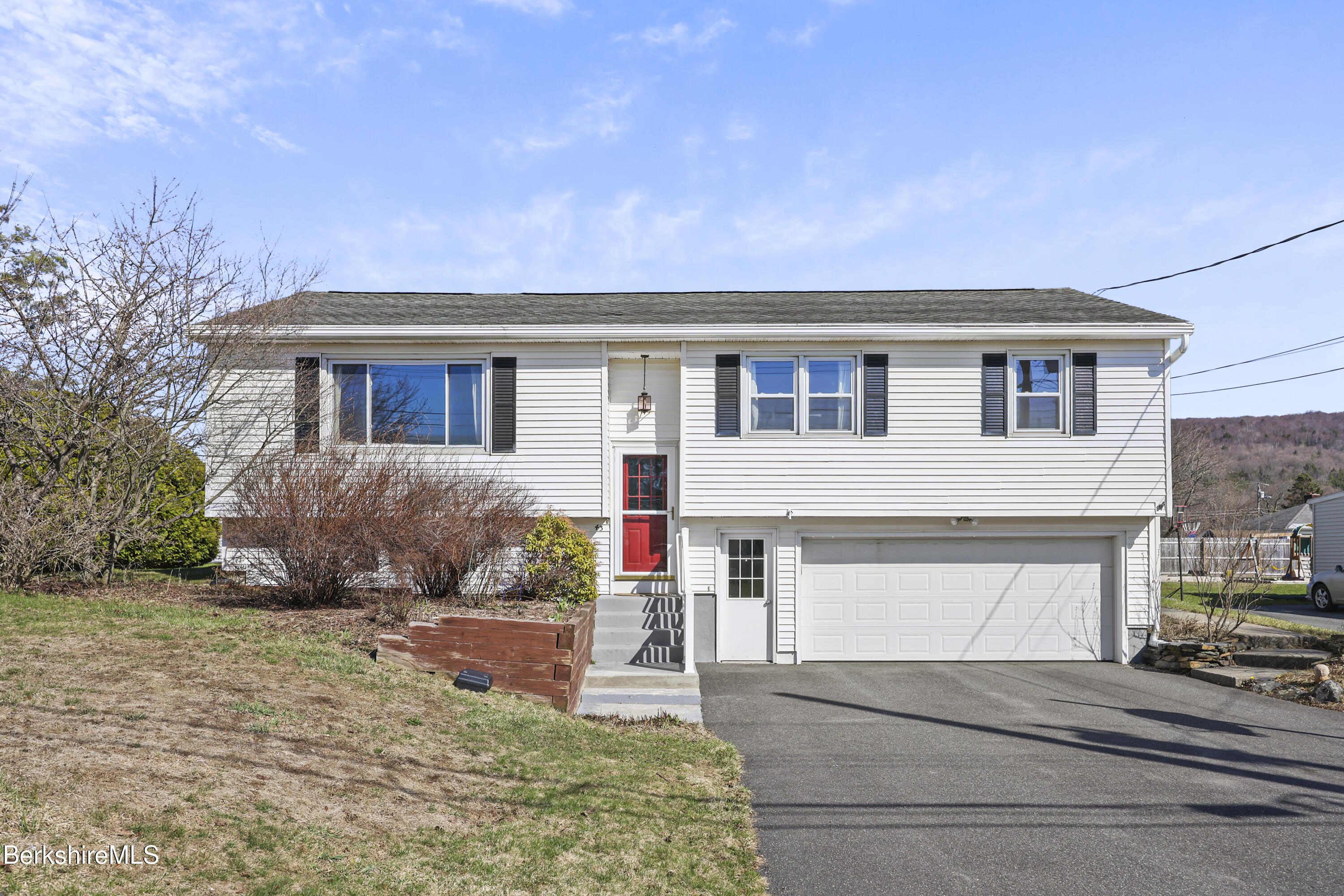 43 Baldwin Avenue Pittsfield, MA 01201 - Photo 2 of 31 a front view of a house with a yard