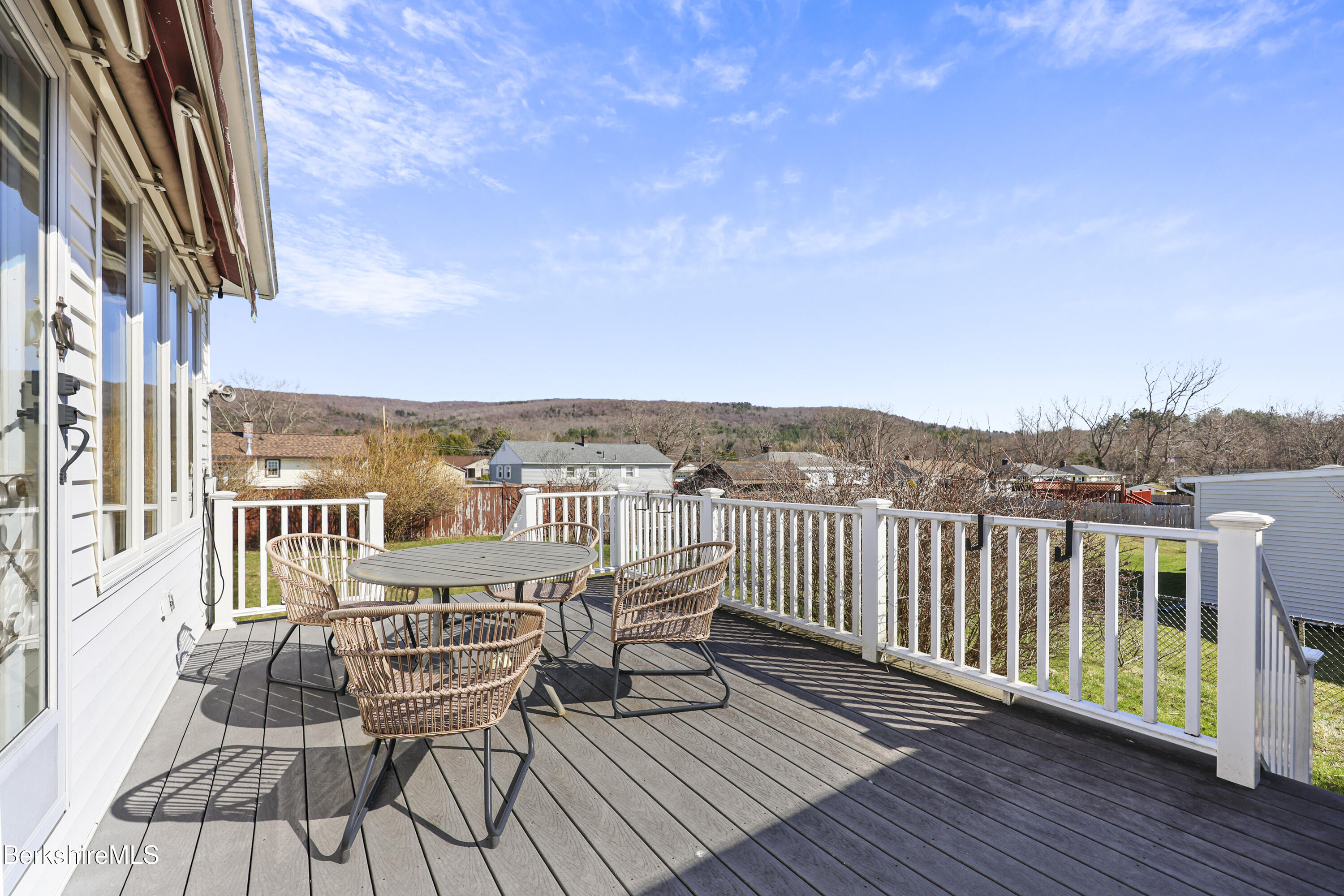43 Baldwin Avenue Pittsfield, MA 01201 - Photo 6 of 31 a view of a balcony with lounge chair