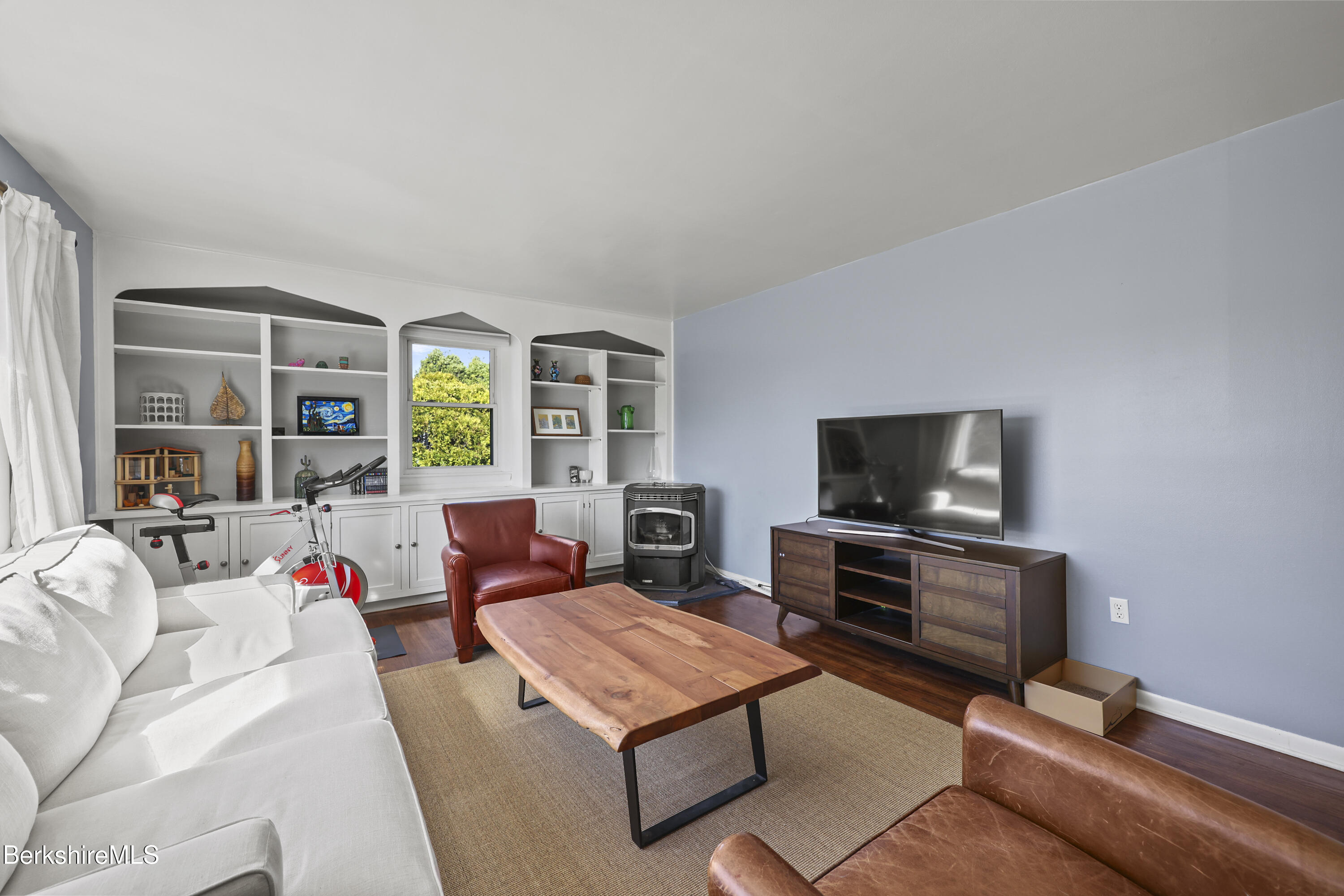 43 Baldwin Avenue Pittsfield, MA 01201 - Photo 10 of 31 a living room with furniture and a flat screen tv
