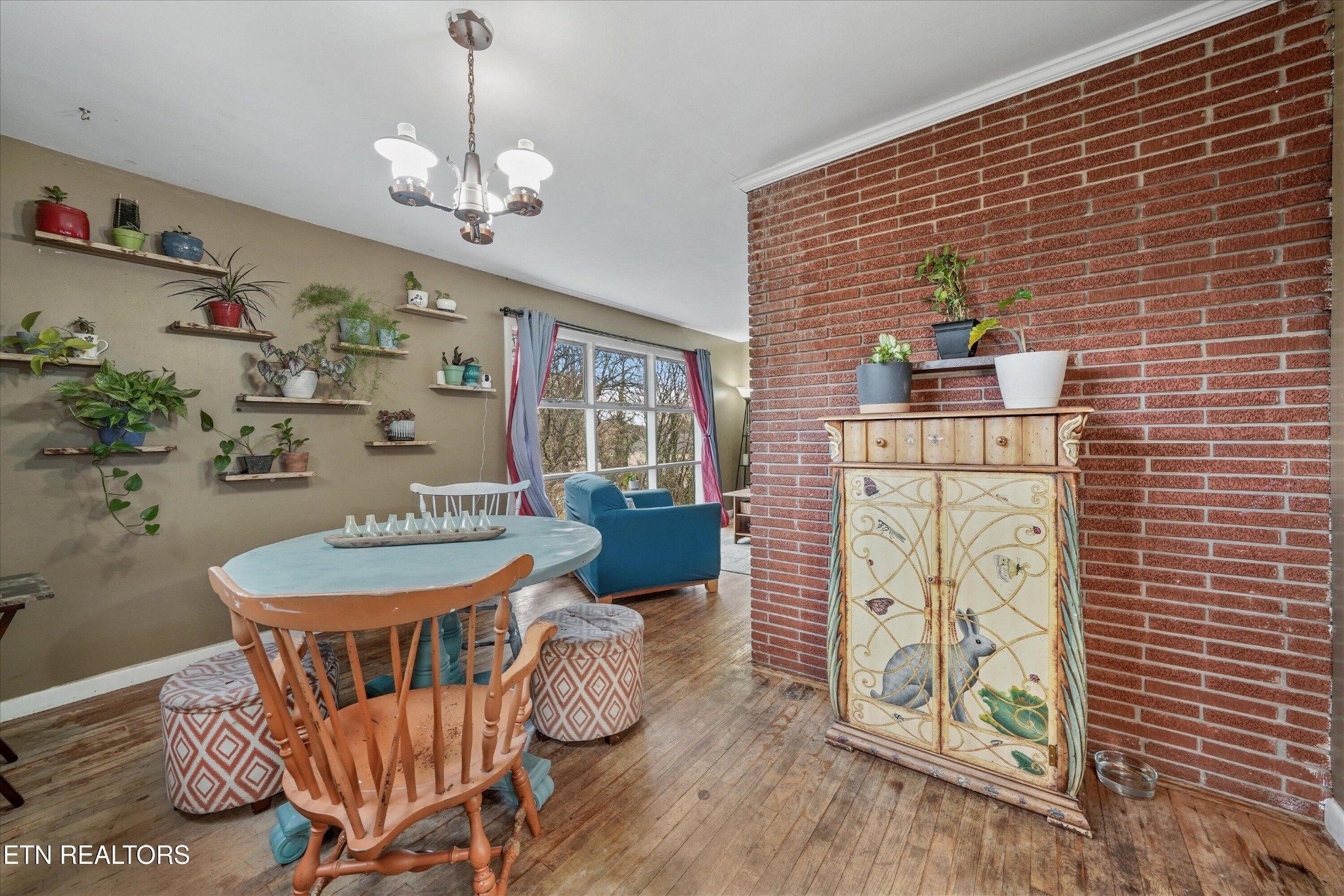 225 West Ford Valley Road Knoxville, TN 37920 - Photo 13 of 24 a view of a dining room with furniture and wooden floor