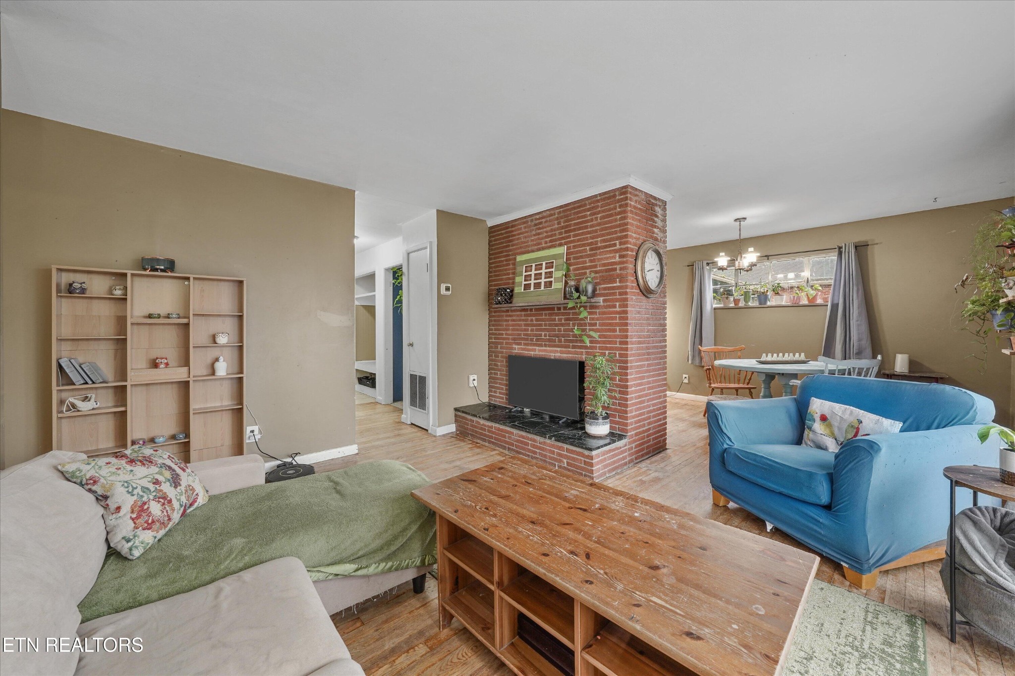 225 West Ford Valley Road Knoxville, TN 37920 - Photo 16 of 24 a living room with furniture and a fireplace