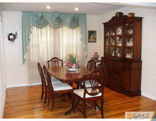 10 Phillips Road Edison, NJ 08817 - Photo 3 of 9 a view of a dining room with furniture and window