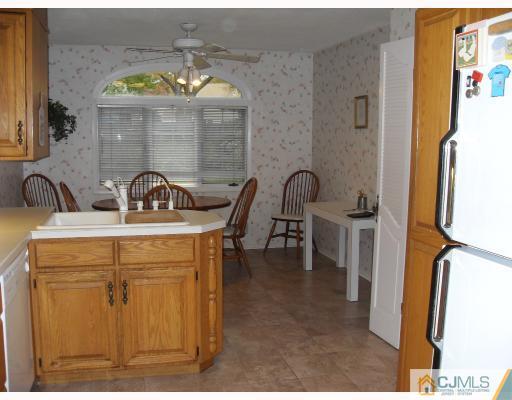 10 Phillips Road Edison, NJ 08817 - Photo 7 of 9 a kitchen view with a sink and breakfast area