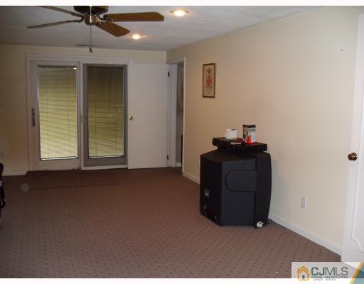 10 Phillips Road Edison, NJ 08817 - Photo 8 of 9 a room with a cabinet and a window