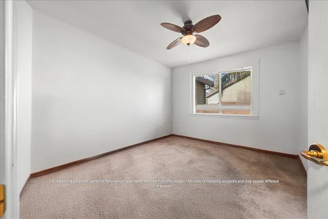 a view of a chairs and table in the patio