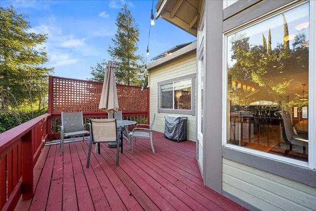 a view of a backyard with sitting area