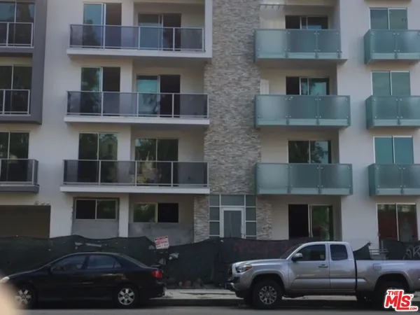 a car parked in front of a building
