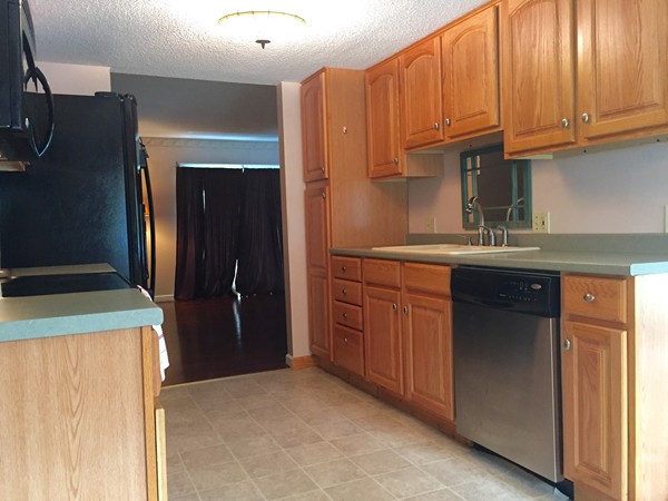 610 County Road, Unit 4 Holyoke, MA 01040 - Photo 6 of 21 a kitchen with stainless steel appliances granite countertop a refrigerator and a sink
