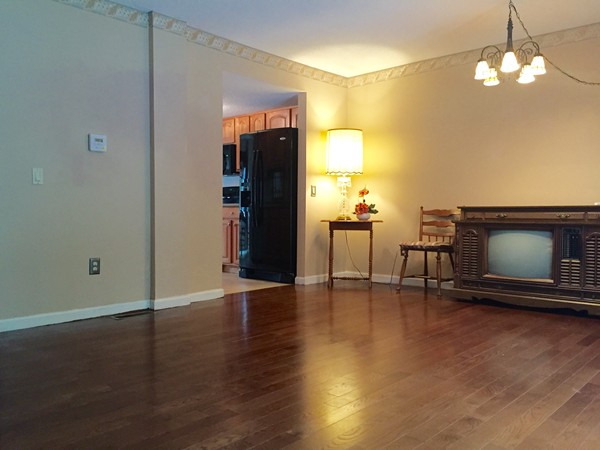 610 County Road, Unit 4 Holyoke, MA 01040 - Photo 10 of 21 a view of an empty room with furniture and a fireplace