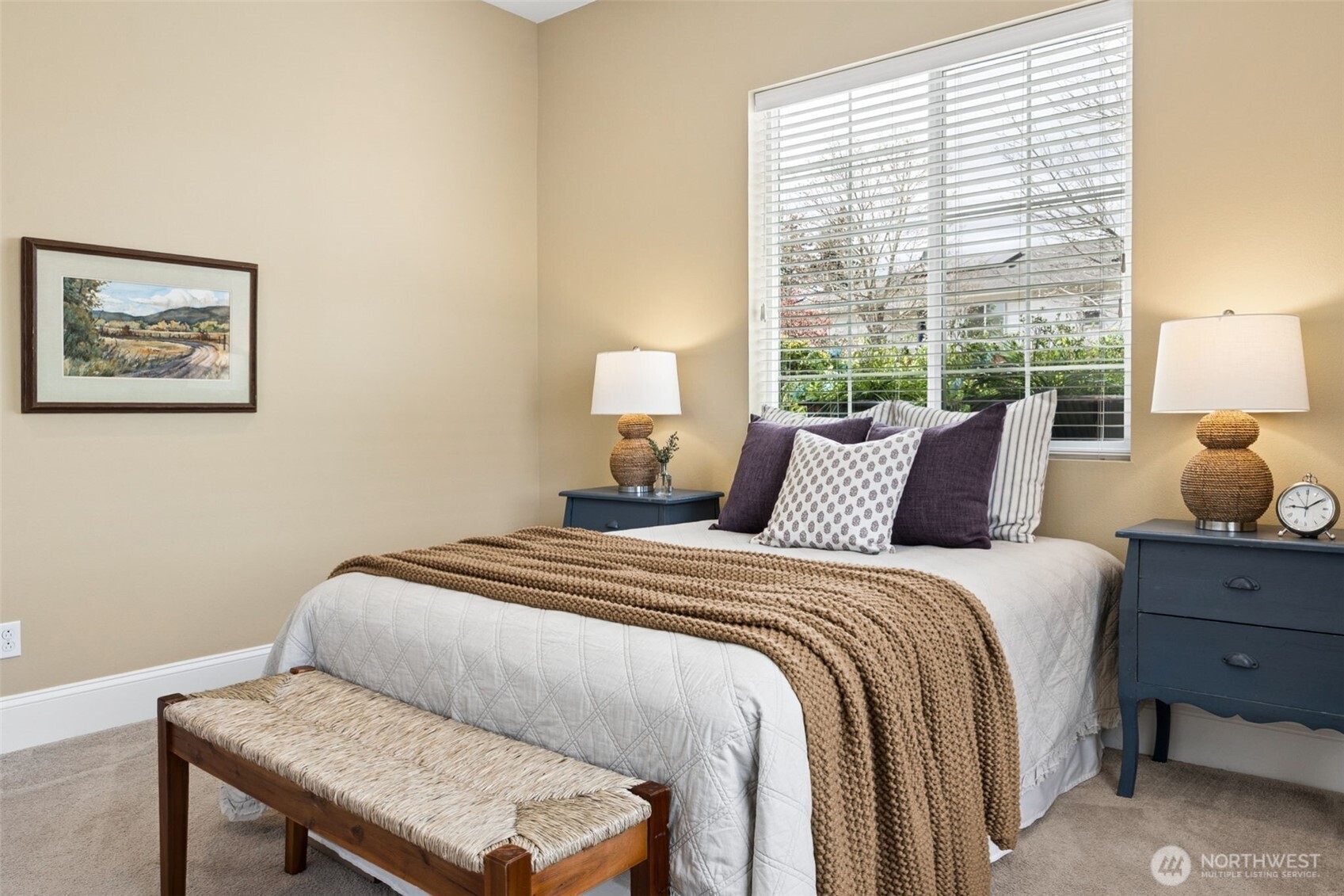8265 Orcas Loop Northeast Lacey, WA 98516 - Photo 16 of 40 a bedroom with a bed and window