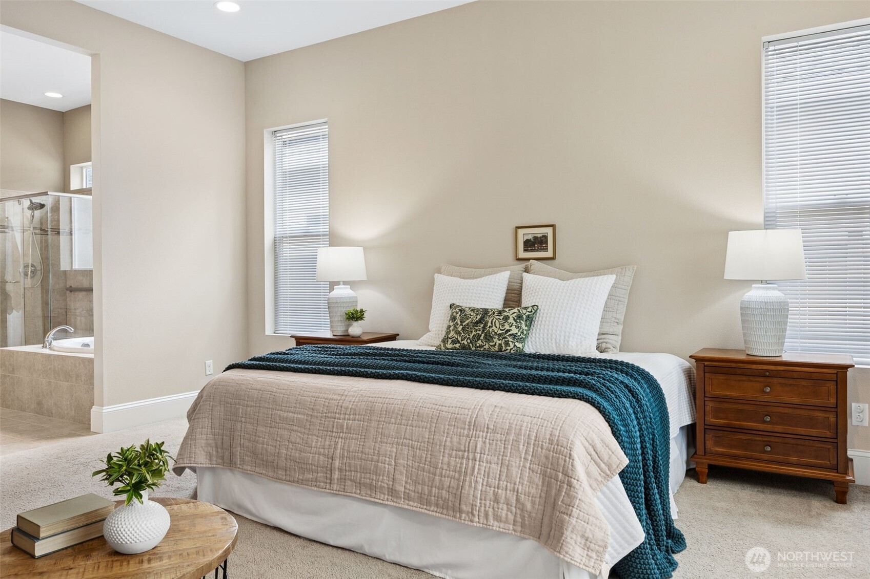 8265 Orcas Loop Northeast Lacey, WA 98516 - Photo 22 of 40 a bedroom with a bed and wooden floor