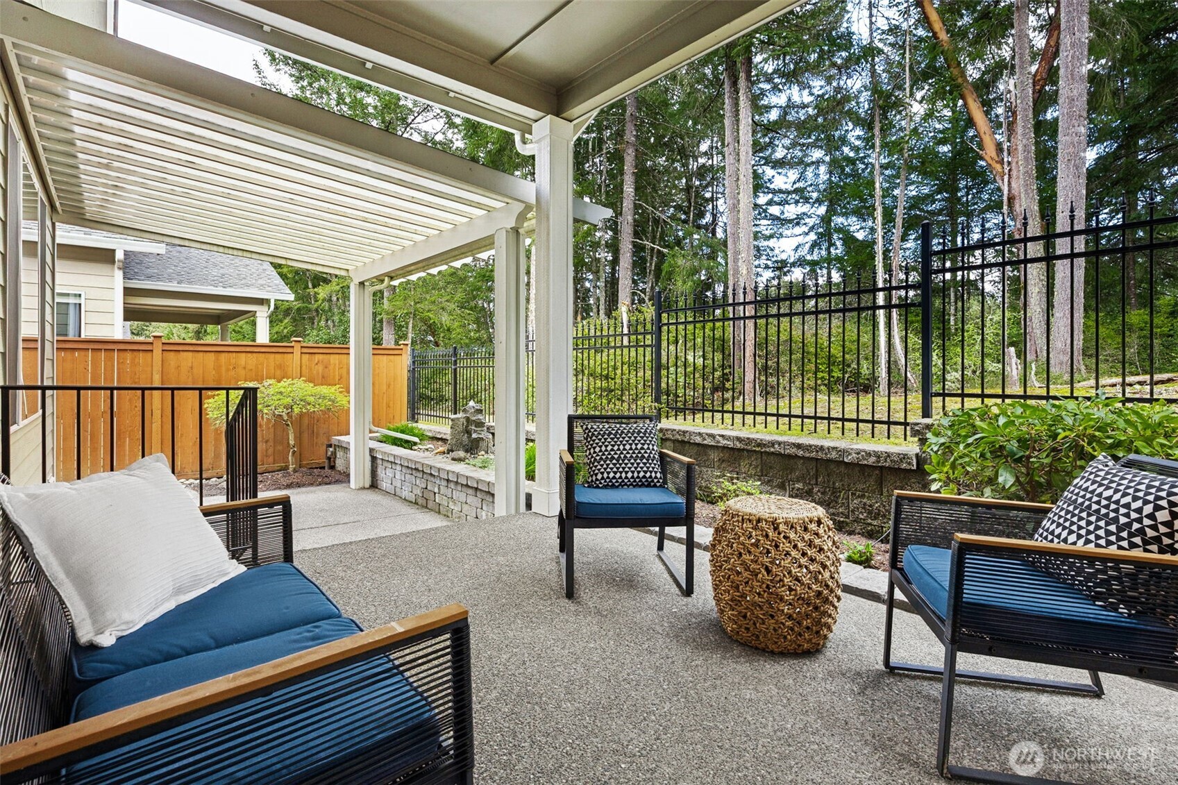 8265 Orcas Loop Northeast Lacey, WA 98516 - Photo 28 of 40 a balcony with furniture and a garden