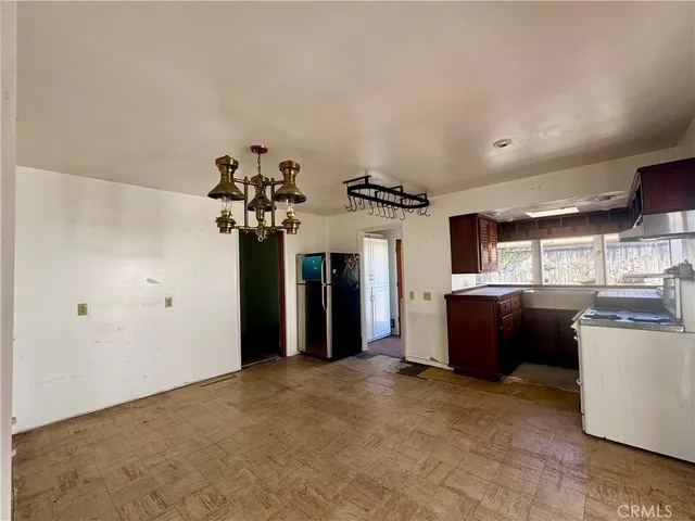a view of a kitchen with a sink