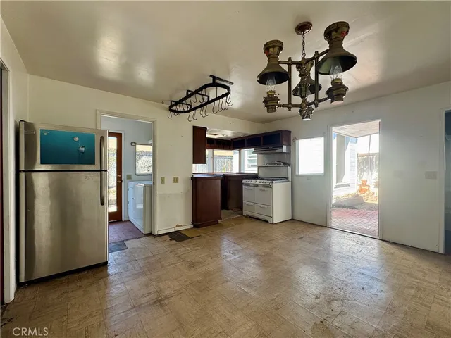 a view of a kitchen with a sink