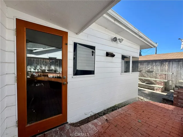 a living room with furniture a window and a fireplace