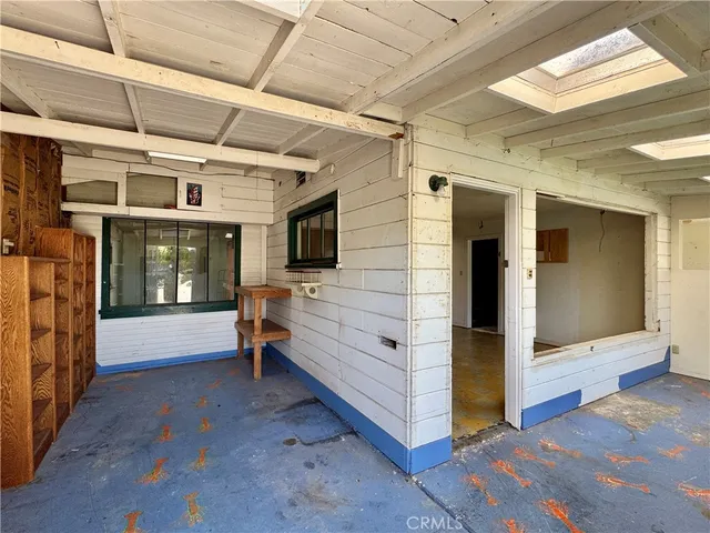 a view of a hallway with stairs
