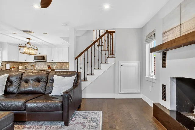 a view of a dining room with furniture and window