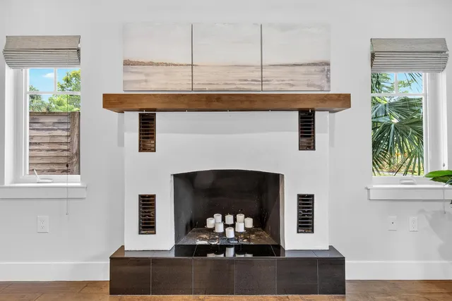 a kitchen with stainless steel appliances granite countertop a stove a sink and cabinets