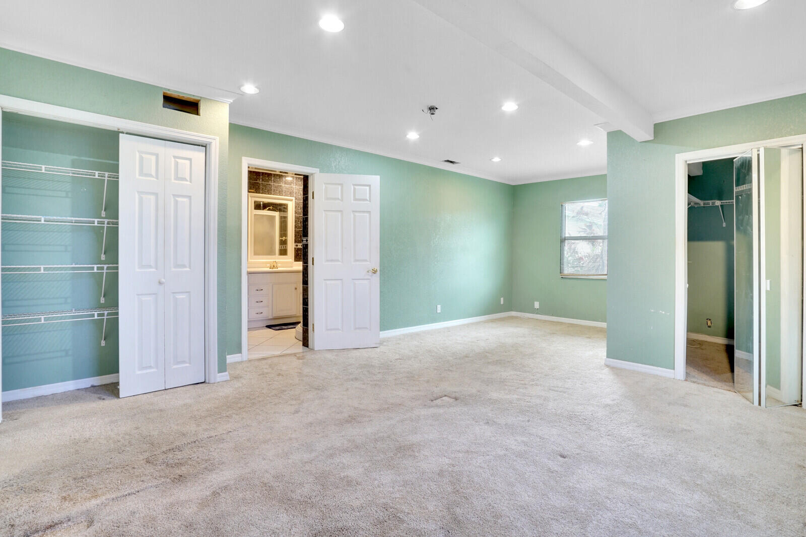 3230 Buccaneer Road Lake Worth, FL 33462 - Photo 16 of 24 an empty room with closet and a bathroom