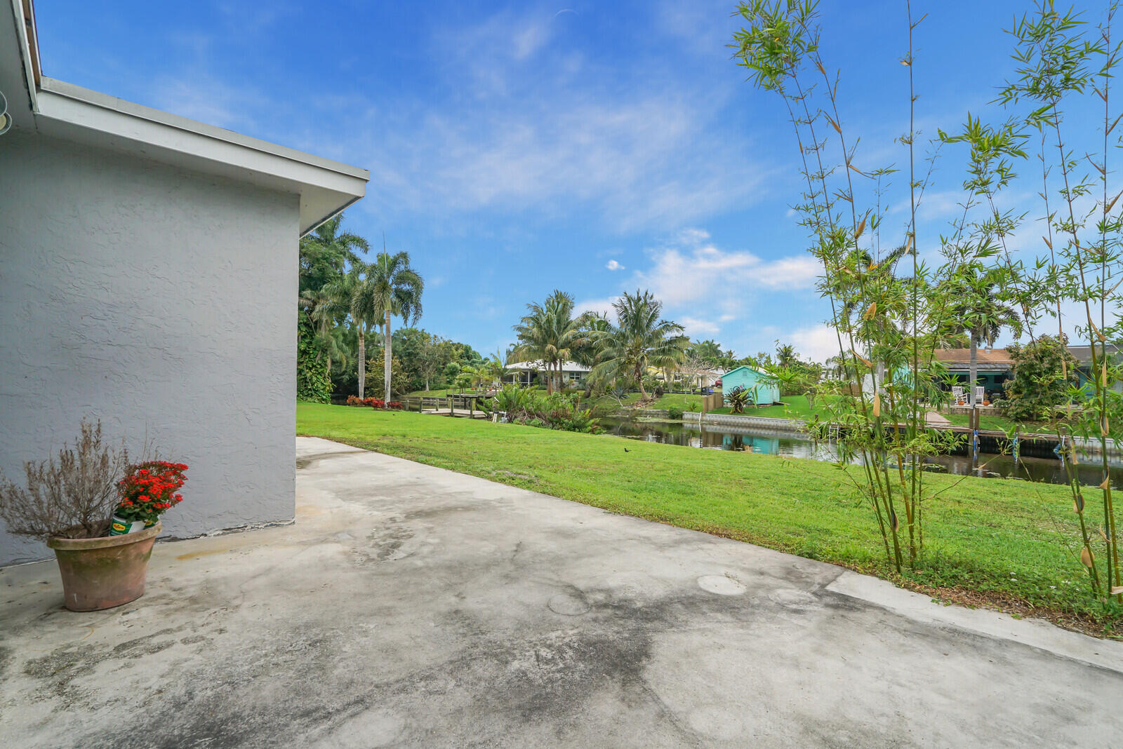 3230 Buccaneer Road Lake Worth, FL 33462 - Photo 21 of 24 a view of a house with a backyard