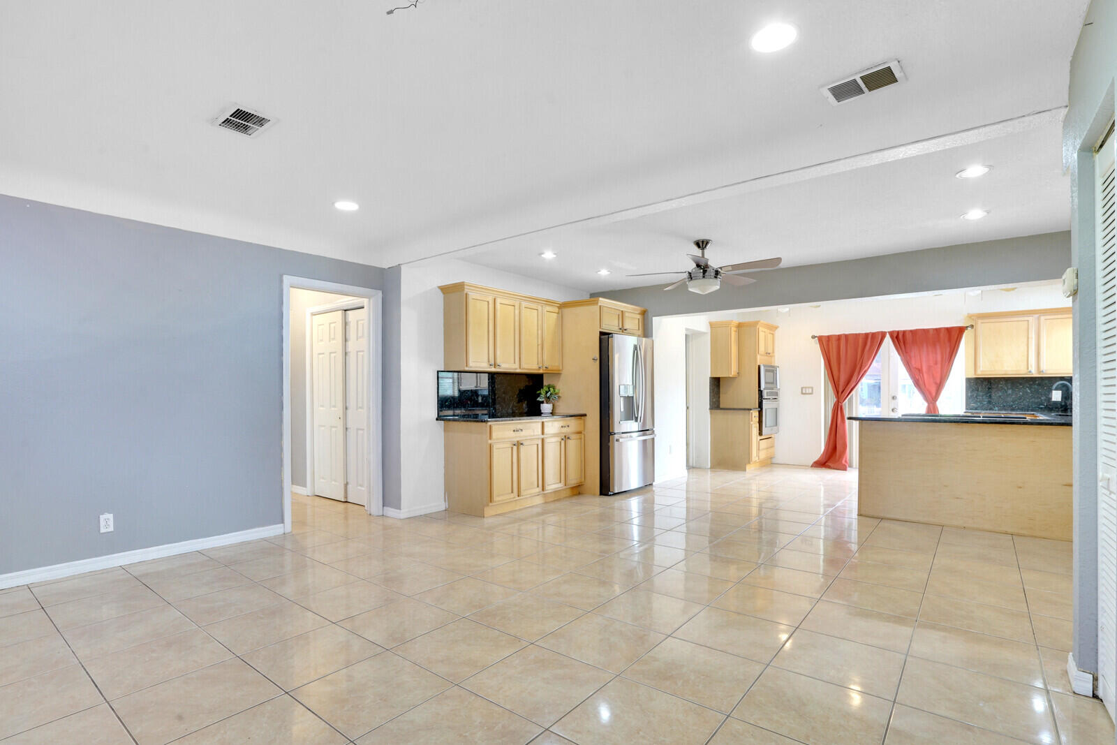 3230 Buccaneer Road Lake Worth, FL 33462 - Photo 10 of 24 a view of an entryway with kitchen and windows