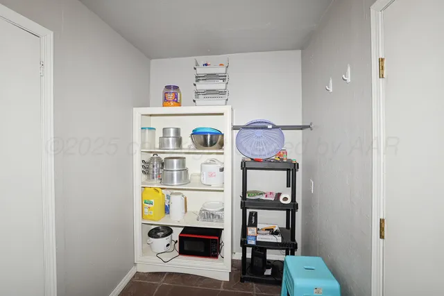 a room with storage and utility
